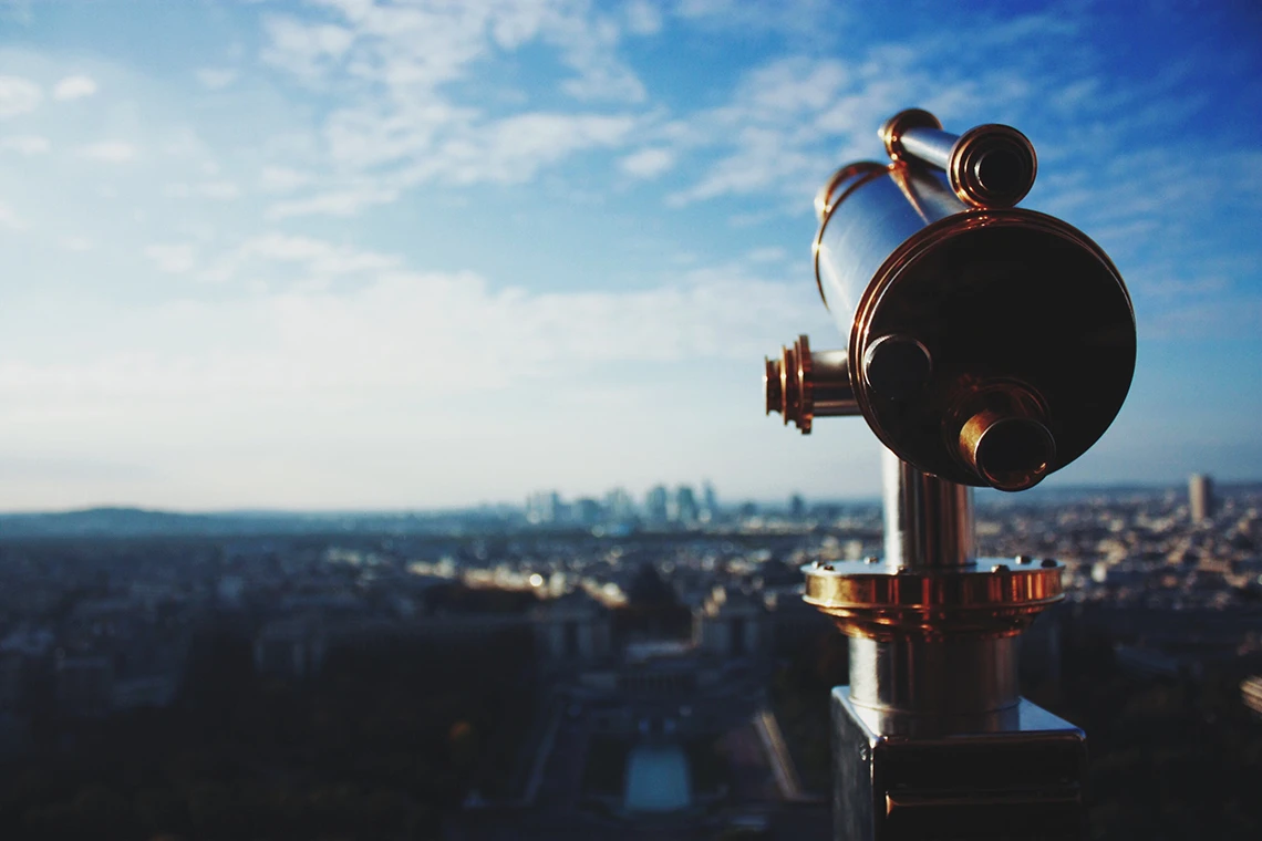 A viewfinder looking out over a city skyline